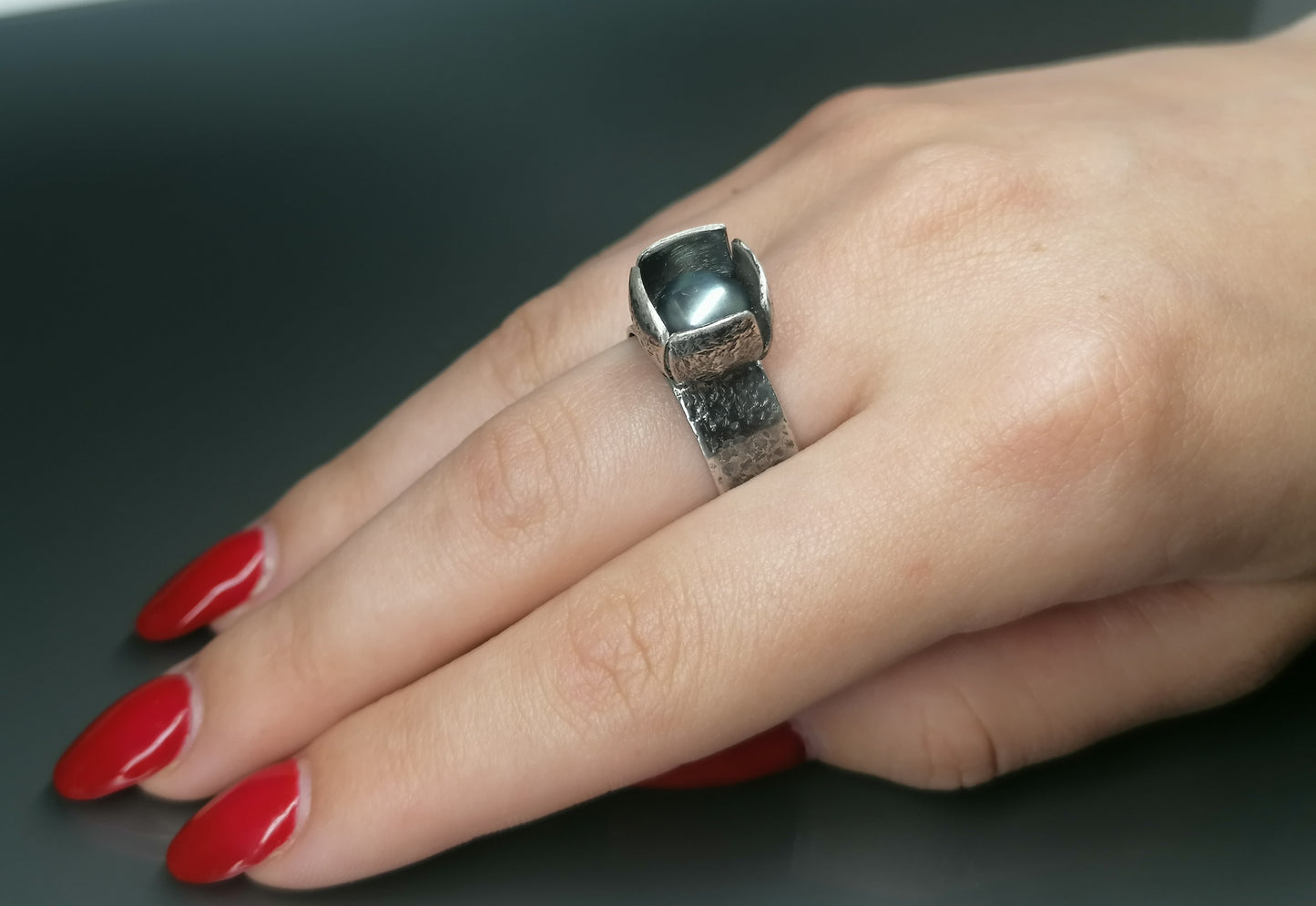 Silver ring with a pearl