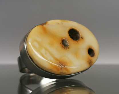 Large ring with milky amber.