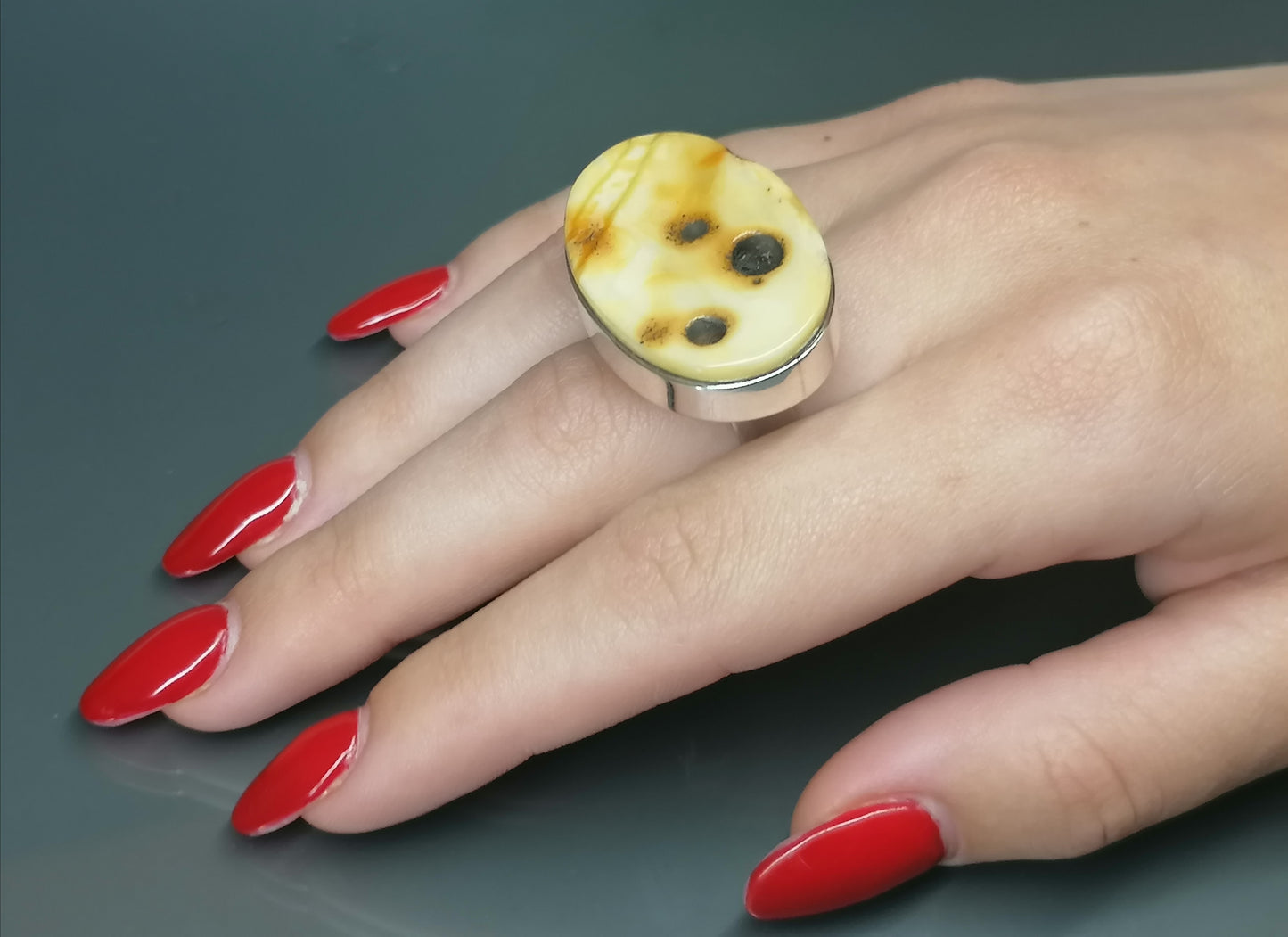 Large ring with milky amber.