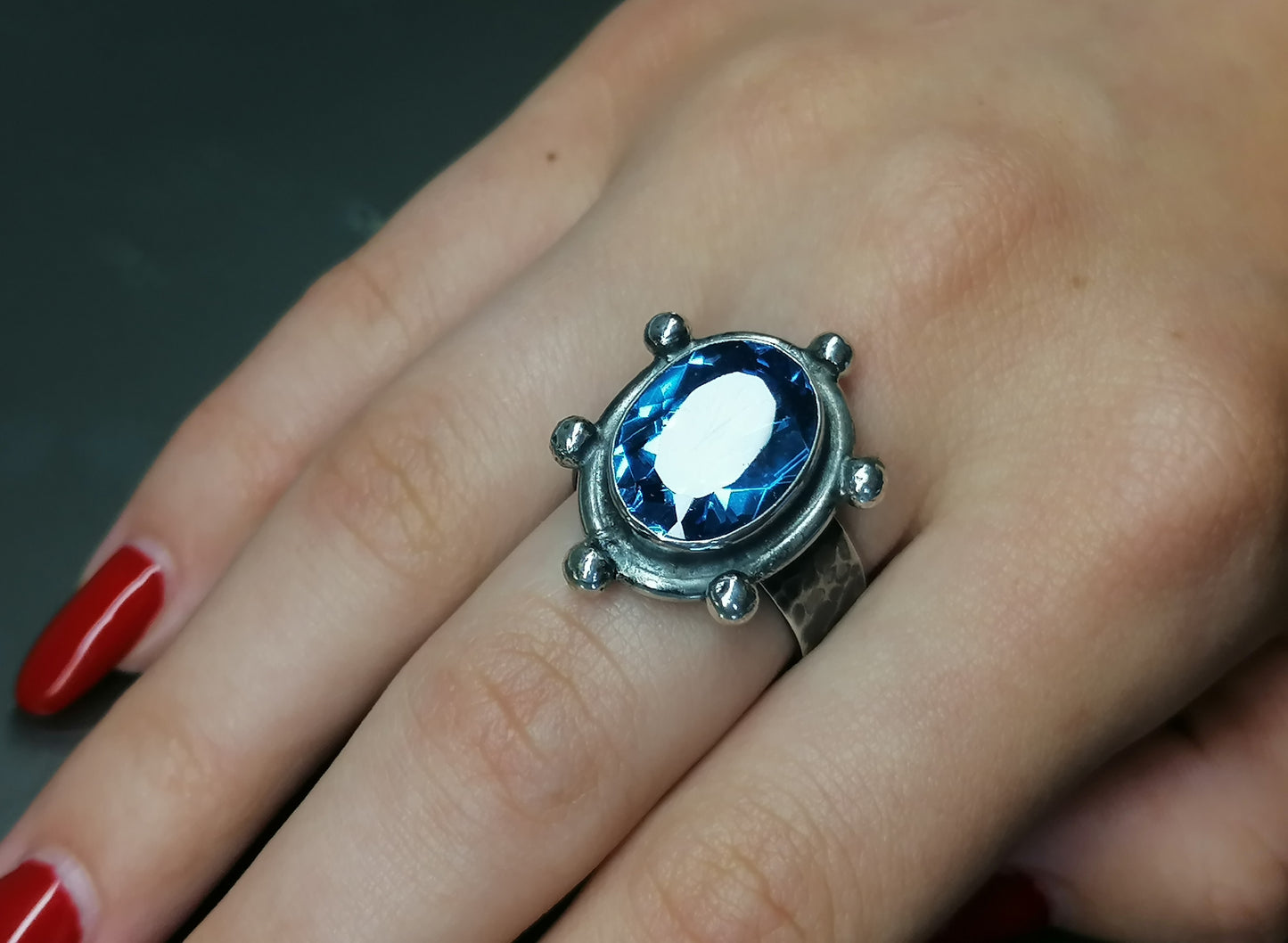 Ring with a large blue zircon