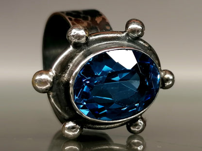 Ring with a large blue zircon