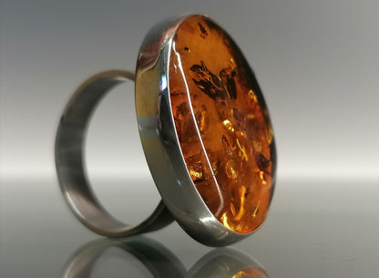 Silver ring with oval amber 