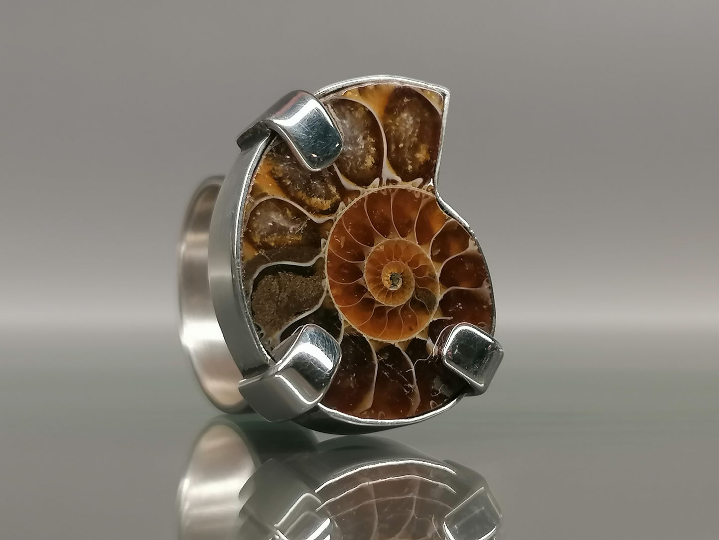 An unusual silver ring with ammonite