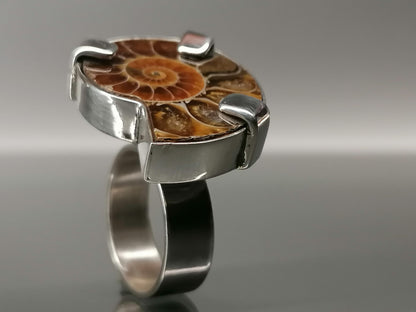 An unusual silver ring with ammonite