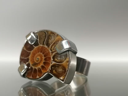 An unusual silver ring with ammonite