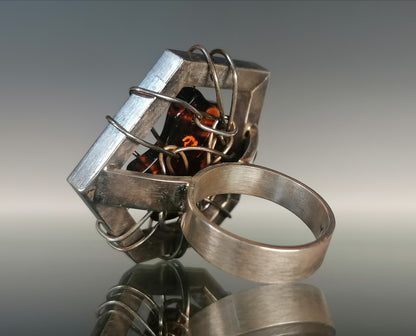 Innovative amber ring