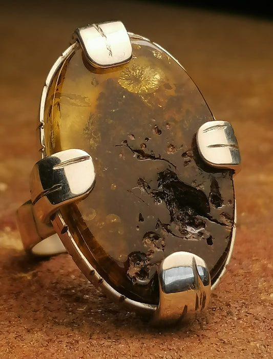 Silver ring with large amber 