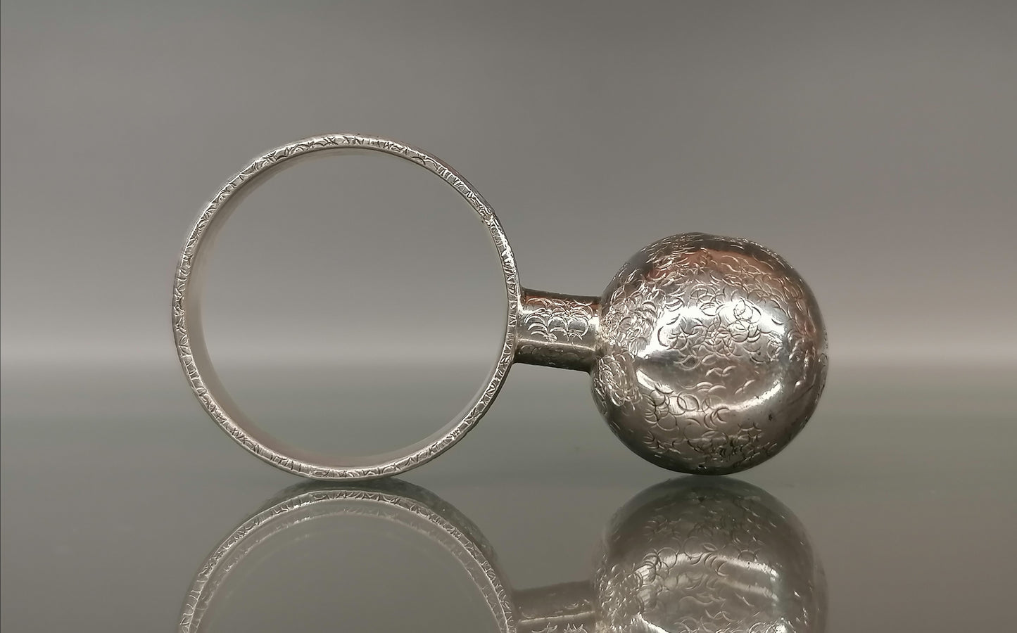 Silver ring with a ball 