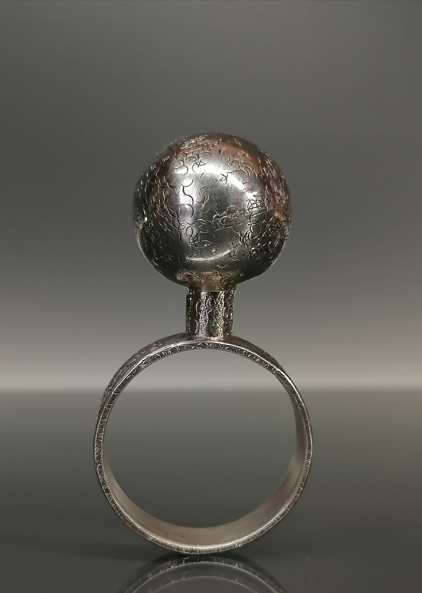 Silver ring with a ball 