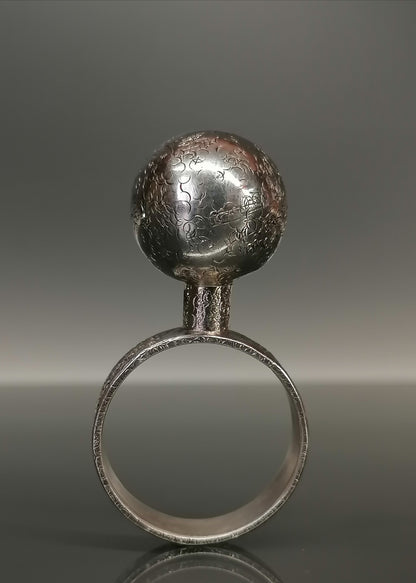 Silver ring with a ball 