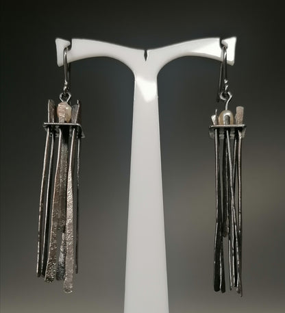 Silver earrings with a pearl 