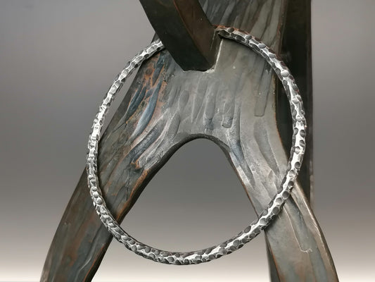 Elegant forged silver ring-bracelet