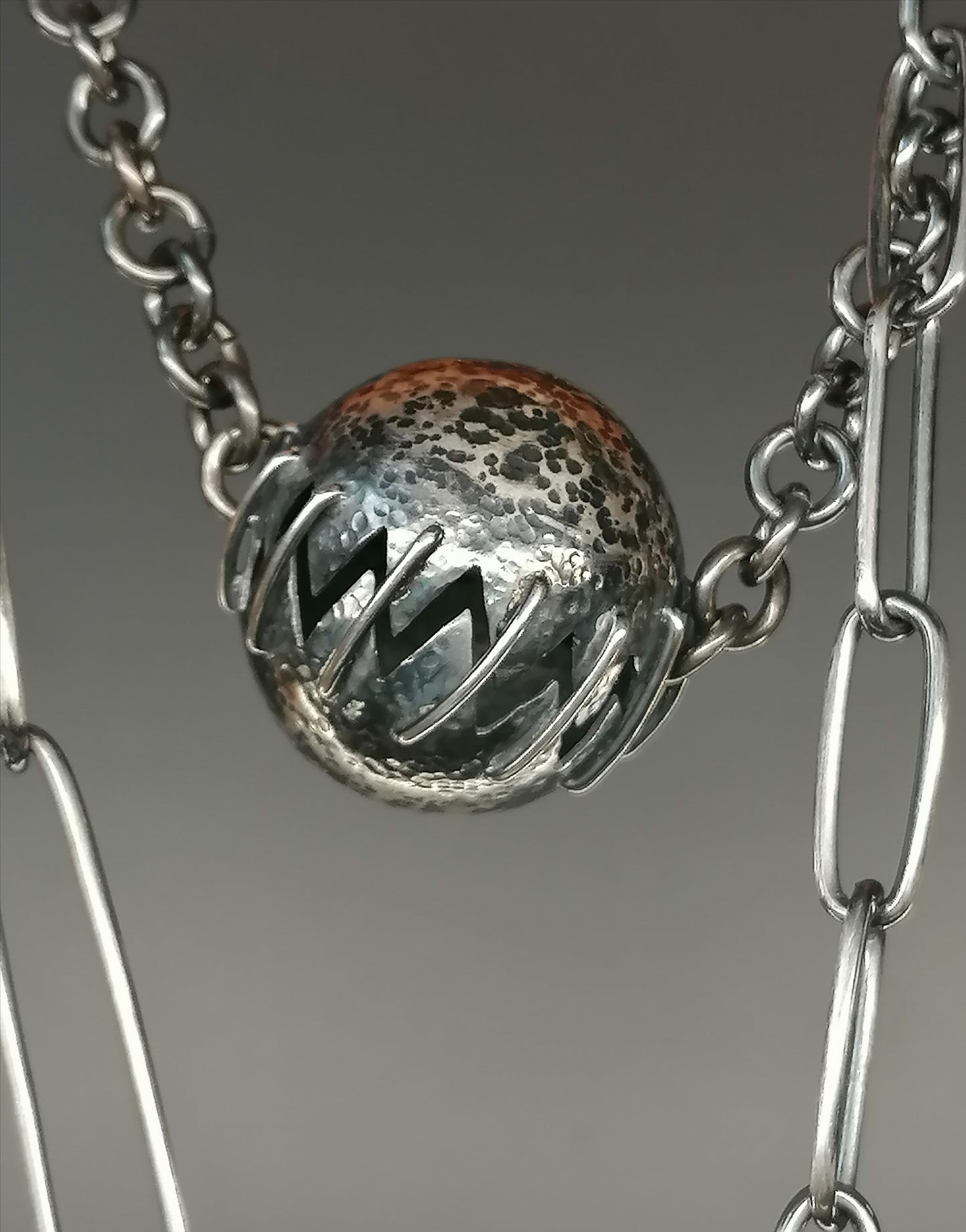 A unique and unique silver bullet necklace 