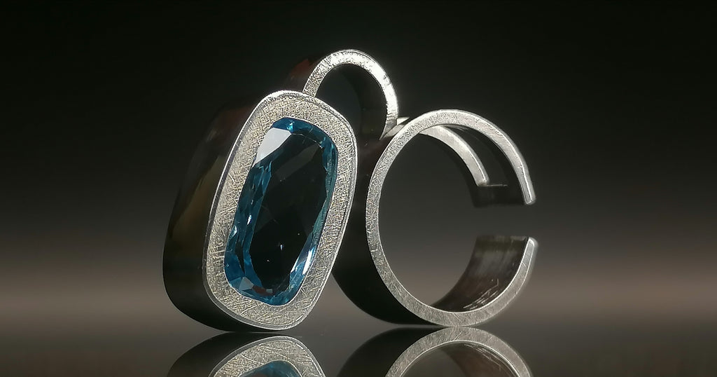 Pierścień srebro / topaz